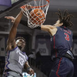 
              TCU guard Shahada Wells (13) scores against Jackson State forward Trace Young (3) during the first half of an NCAA college basketball game in Fort Worth, Texas, Tuesday, Dec. 6, 2022. (AP Photo/LM Otero)
            