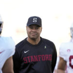 
              Stanford head coach David Shaw, middle, watches during warmup before an NCAA college football game against California in Berkeley, Calif., Saturday, Nov. 19, 2022. (AP Photo/Godofredo A. Vásquez)
            