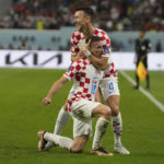 
              Croatia's Mislav Orsic front, and Croatia's Ivan Perisic celebrate after a goal uring the World Cup third-place playoff soccer match between Croatia and Morocco at Khalifa International Stadium in Doha, Qatar, Friday, Dec. 16, 2022. (AP Photo/Thanassis Stavrakis)
            