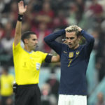 
              France's Antoine Griezmann reacts after missing an opportunity to score during the World Cup semifinal soccer match between France and Morocco at the Al Bayt Stadium in Al Khor, Qatar, Wednesday, Dec. 14, 2022. (AP Photo/Francisco Seco)
            