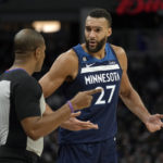 
              Minnesota Timberwolves center Rudy Gobert (27) talks with referee John Butler (30) during the first half of an NBA basketball game against the Dallas Mavericks, Wednesday, Dec. 21, 2022, in Minneapolis. (AP Photo/Abbie Parr)
            
