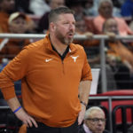 
              Texas head coach Chris Beard watches from the sidelines during the second half of an NCAA college basketball game against Northern Arizona, Monday, Nov. 21, 2022, in Edinburg, Texas. (AP Photo/Eric Gay)
            