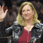 
              FILE - WNBA commissioner Cathy Engelbert waves to the crowd before Game 2 in the semifinals of the WNBA playoffs between the Las Vegas Aces and the Phoenix Mercury Thursday, Sept. 30, 2021, in Las Vegas. (AP Photo/David Becker, File)
            