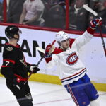 
              Montreal Canadiens center Kirby Dach (77) celebrates his goal in front of Ottawa Senators left wing Brady Tkachuk (7) during the third period of an NHL hockey game in Ottawa, Ontario on Wednesday, Dec. 14, 2022. (Justin Tang/The Canadian Press via AP)
            