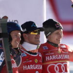 
              From left, second placed Norway's Henrik Kristoffersen, the winner Norway's Lucas Braathen and third placed Switzerland's Marco Odermatt celebrate after an alpine ski, men's World Cup giant slalom, in Alta Badia, Italy, Sunday, Dec. 18, 2022. (AP Photo/Gabriele Facciotti)
            