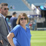 
              FILE - Tennessee Titans owner Amy Adams Strunk, right, and general manager Jon Robinson watch players warm up before an NFL football game against the Jacksonville Jaguars, Sunday, Oct. 10, 2021, in Jacksonville, Fla. Amy Adams Strunk has very high standards for her Titans. Combined with the millions and millions she's investing, she also isn't afraid of making big moves chasing the Lombardi Trophy that eluded her late father. Strunk fired general manager Jon Robinson on Tuesday, Dec. 6, 2022, in the midst of his seventh season with the Titans off to a 7-5 start. (AP Photo/Phelan M. Ebenhack, File)
            