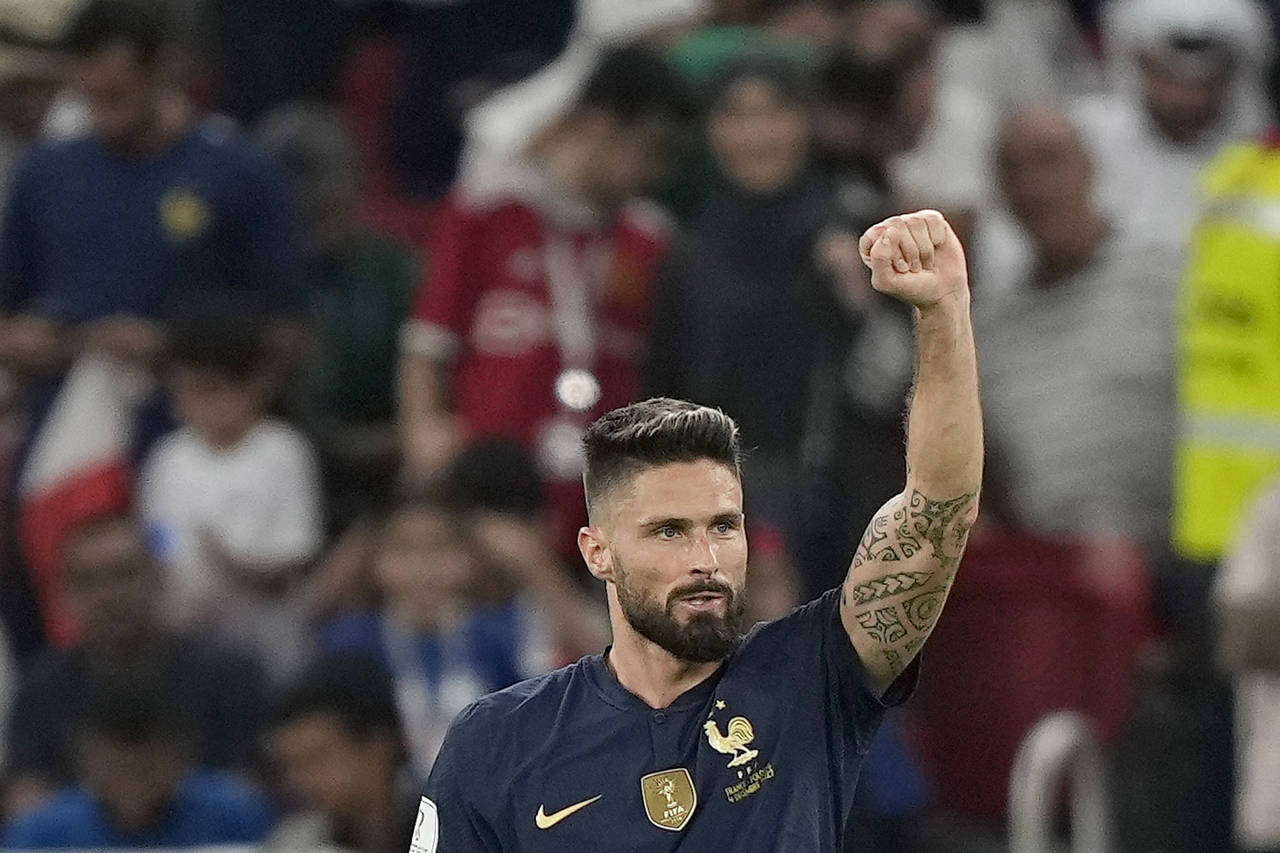 France's Olivier Giroud celebrates scoring his side's first goal during the World Cup round of 16 s...