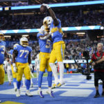 
              Los Angeles Chargers wide receiver Mike Williams, right, celebrates his touchdown catch with wide receiver Joshua Palmer (5) during the first half of an NFL football game against the Miami Dolphins Sunday, Dec. 11, 2022, in Inglewood, Calif. (AP Photo/Jae C. Hong)
            