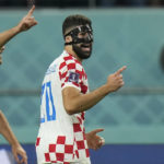 
              Croatia's Josko Gvardiol, right, celebrates after scoring his side's opening goal during the World Cup third-place playoff soccer match between Croatia and Morocco at Khalifa International Stadium in Doha, Qatar, Saturday, Dec. 17, 2022. (AP Photo/Francisco Seco)
            