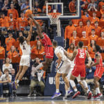 
              Houston forward Jarace Walker (25) goes up with the ball up during the second half of an NCAA college basketball game against Virginia in Charlottesville, Va., Saturday, Dec. 17, 2022. (AP Photo/Erin Edgerton)
            