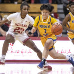 
              Morehead State guard Sandra Lin (3) is defended by Indiana guard Chloe Moore-McNeil (22) during the second half of an NCAA college basketball game, Sunday, Dec. 18, 2022, in Bloomington, Ind. (AP Photo/Doug McSchooler)
            