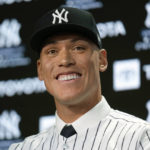 
              New York Yankees' Aaron Judge participates in a news conference at Yankee Stadium, Wednesday, Dec. 21, 2022, in New York. Judge has been appointed captain of the New York Yankees after agreeing to a $360 million, nine-year contract to remain in pinstripes. (AP Photo/Seth Wenig)
            