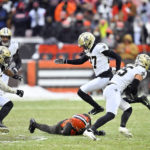 
              New Orleans Saints safety Daniel Sorensen (25) intercepts a pass intended for Cleveland Browns wide receiver David Bell during the second half of an NFL football game, Saturday, Dec. 24, 2022, in Cleveland. (AP Photo/David Richard)
            