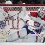 
              Montreal Canadiens goaltender Jake Allen protects the net in the second period of an NHL hockey game against the Colorado Avalanche Wednesday, Dec. 21, 2022, in Denver. (AP Photo/David Zalubowski)
            