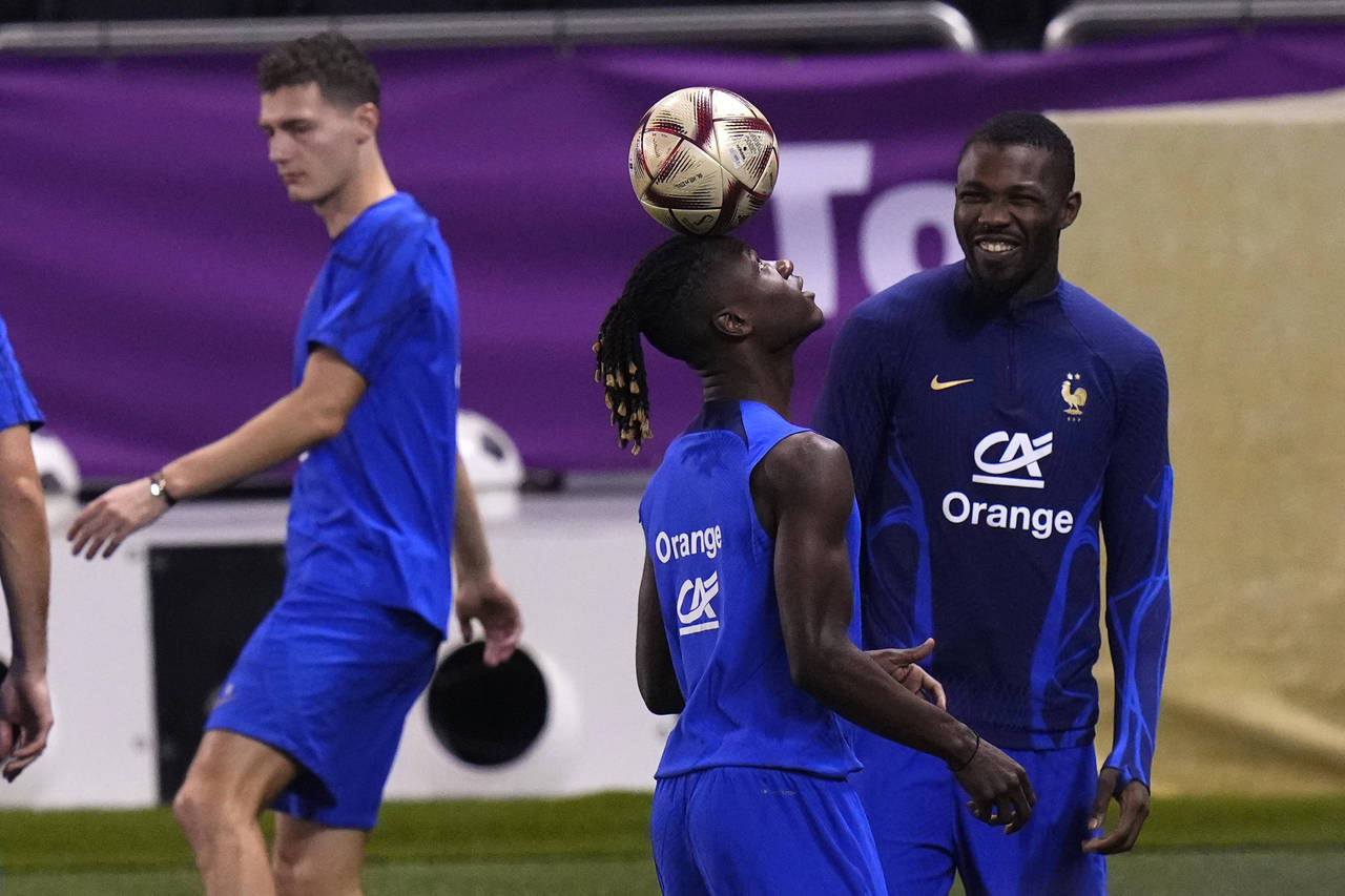 France's Eduardo Camavinga juggles the ball during the training session at the Jassim Bin Hamad sta...