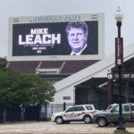 
              The video board at Davis Wade Stadium displays a message in memory of Mississippi State NCAA college football coach Mike Leach, Tuesday, Dec. 13, 2022, in Starkville, Miss. Leach, 61, died Monday night, Dec. 12, at the University of Mississippi Medical Center in Jackson following complications from a heart condition, the university announced. (Theo DeRosa/The Commercial Dispatch, via AP)
            