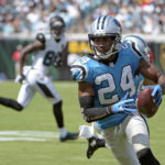 
              FILE - Carolina Panthers cornerback Josh Norman (24) runs back an interception against the Jacksonville Jaguars for a 30-yard touchdown during the second half of an NFL football game on Sept. 13, 2015, in Jacksonville, Fla. The Panthers worked out 35-year-old cornerback Norman on Monday, Dec. 26, 2022, because starter Jaycee Horn’s status for Sunday’s crucial game against the Tampa Bay Buccaneers is up in the air. (AP Photo/Phelan M. Ebenhack, File)
            