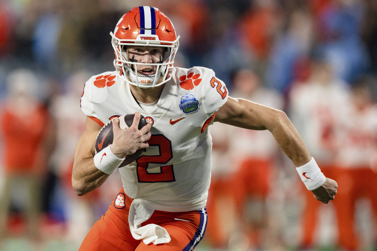 Clemson quarterback Cade Klubnik runs with the ball in the first half during the Atlantic Coast Con...