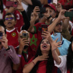 
              Morocco fans cheer prior of the World Cup group F soccer match between Canada and Morocco at the Al Thumama Stadium in Doha , Qatar, Thursday, Dec. 1, 2022. (AP Photo/Manu Fernandez)
            