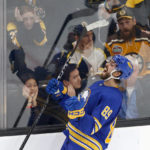 
              Buffalo Sabres right wing Alex Tuch (89) celebrates after scoring the game-winning goal during the overtime period of an NHL hockey game against the Boston Bruins, Saturday, Dec. 31, 2022, in Boston. (AP Photo/Mary Schwalm)
            