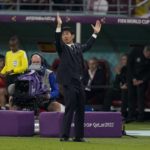 
              Japan's head coach Hajime Moriyasu reacts during the World Cup group E soccer match between Japan and Spain, at the Khalifa International Stadium in Doha, Qatar, Thursday, Dec. 1, 2022. (AP Photo/Darko Vojinovic)
            