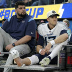 
              Tennessee Titans quarterback Ryan Tannehill, right, is carted off the field during the first half of an NFL football game against the Los Angeles Chargers in Inglewood, Calif., Sunday, Dec. 18, 2022. (AP Photo/Marcio Jose Sanchez)
            