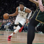 
              Milwaukee Bucks forward Giannis Antetokounmpo (34) drives to the basket against the Boston Celtics during the first half of an NBA basketball game, Sunday, Dec. 25, 2022, in Boston. (AP Photo/Mary Schwalm)
            