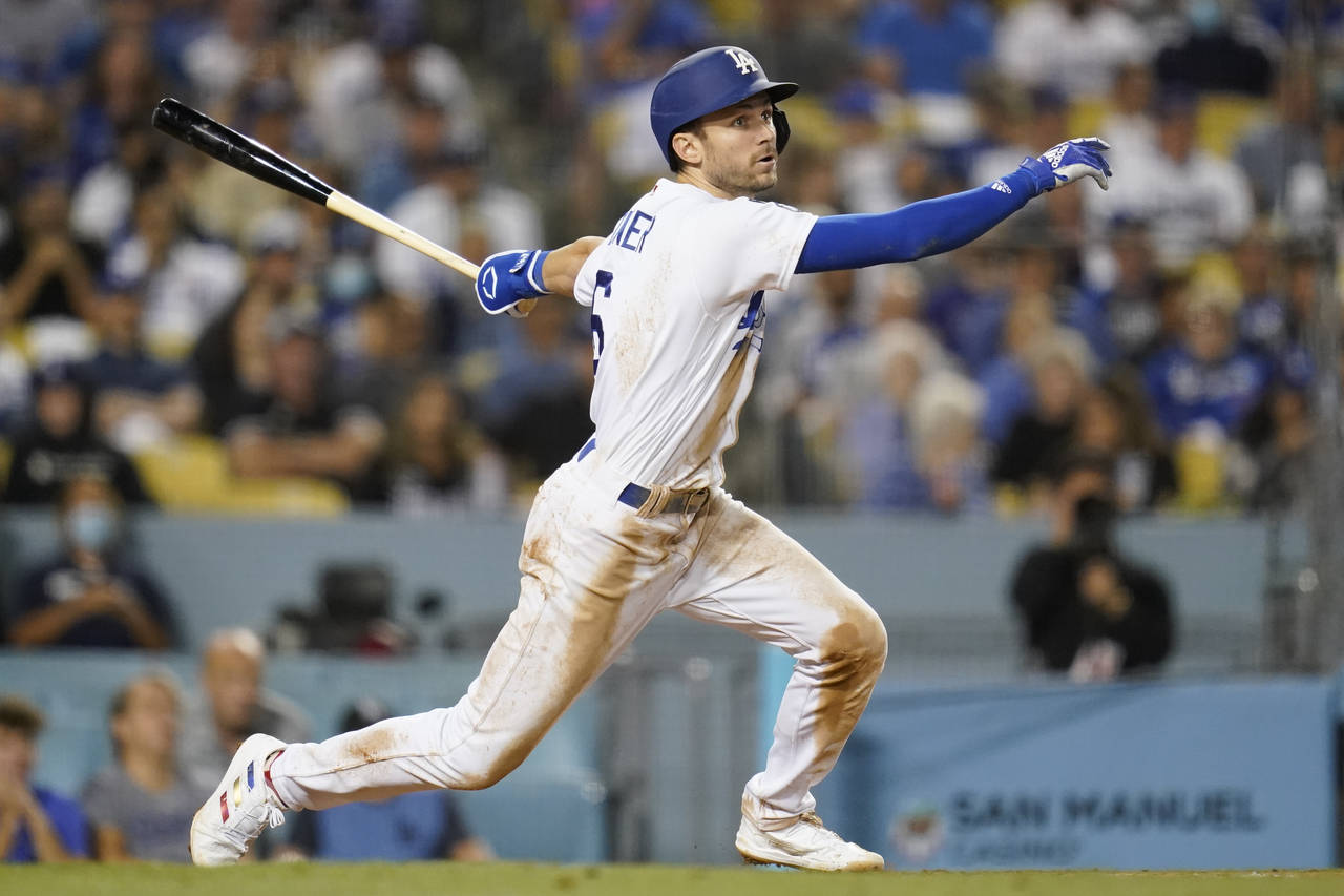 FILE - Los Angeles Dodgers' Trea Turner (6) bats during a baseball game against the New York Mets T...