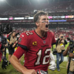 
              Tampa Bay Buccaneers quarterback Tom Brady (12) reacts to the fans as he runs off the field after an NFL football game against the New Orleans Saints in Tampa, Fla., Monday, Dec. 5, 2022. The Buccaneers won 17-16. (AP Photo/Chris O'Meara)
            