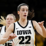 
              Iowa guard Caitlin Clark reacts after making a basket during the first half of an NCAA college basketball game against North Carolina State, Thursday, Dec. 1, 2022, in Iowa City, Iowa. (AP Photo/Charlie Neibergall)
            