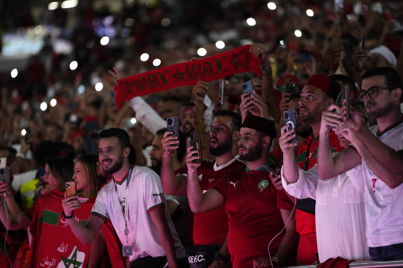 Morocco fans attend the World Cup group F soccer match between Canada and Morocco at the Al Thumama...