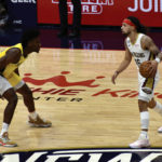 
              New Orleans Pelicans point guard Jose Alvarado dribbles toward Indiana Pacers guard Aaron Nesmith during the first period of an NBA Basketball game, Monday, Dec. 26, 2022, in New Orleans. (Aimee Cronan/The Gazebo Gazette via AP)
            