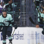 
              Seattle Kraken right wing Daniel Sprong (91) reacts after scoring a goal against the Edmonton Oilers during the second period of an NHL hockey game Friday, Dec. 30, 2022, in Seattle. (AP Photo/Lindsey Wasson)
            