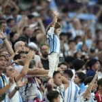 
              Argentina supporters cheer prior to the World Cup round of 16 soccer match between Argentina and Australia at the Ahmad Bin Ali Stadium in Doha, Qatar, Saturday, Dec. 3, 2022. (AP Photo/Frank Augstein)
            