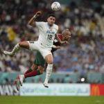 
              Uruguay's Maxi Gomez, left, challenges for the ball with Portugal's Pepe during the World Cup group H soccer match between Portugal and Uruguay, at the Lusail Stadium in Lusail, Qatar, Monday, Nov. 28, 2022. (AP Photo/Martin Meissner)
            