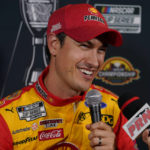 
              FILE - NASCAR Cup Series driver Joey Logano speaks during the NASCAR Championship media day, Thursday, Nov. 3, 2022, in Phoenix. Joey Logano has a simple target for the future even as he celebrates his 2022 NASCAR Cup championship. Add yet another.(AP Photo/Matt York, File)
            