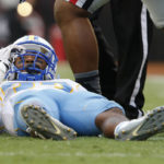 
              FILE - Southern wide receiver Devon Gales (33) lies on the turf after being injured in the second half of an NCAA college football game against Georgia in Athens, Ga., Sept. 26, 2015. Gales, who was left paralyzed, is now a student at Georgia and working to complete his degree communications. (AP Photo/John Bazemore)
            