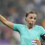 
              Referee Stephanie Frappart holds her arm up during the World Cup group E soccer match between Costa Rica and Germany at the Al Bayt Stadium in Al Khor, Qatar, Thursday, Dec.1, 2022. (AP Photo/Moises Castillo)
            