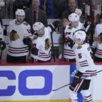 
              Chicago Blackhawks' Connor Murphy (5) celebrates his goal with teammates during the second period of an NHL hockey game against the Nashville Predators Wednesday, Dec. 21, 2022, in Chicago. (AP Photo/Charles Rex Arbogast)
            