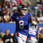 
              New York Giants quarterback Daniel Jones looks to throw during the first half of an NFL football game against the Washington Commanders, Sunday, Dec. 4, 2022, in East Rutherford, N.J. (AP Photo/John Munson)
            