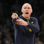 
              Indiana Pacers coach Rick Carlisle calls to players during the first half of the team's NBA basketball game against the Boston Celtics, Wednesday, Dec. 21, 2022, in Boston. (AP Photo/Charles Krupa)
            