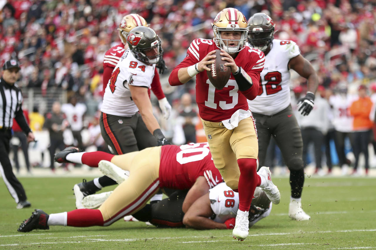 San Francisco 49ers' Brock Purdy rushes for a touchdown against the Tampa Bay Buccaneers during the...