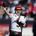 
              Cincinnati Bengals quarterback Joe Burrow winds up to pass while warming up prior to an NFL football game between the Bengals and the New England Patriots, Saturday, Dec. 24, 2022, in Foxborough, Mass. (AP Photo/Charles Krupa)
            