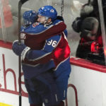 
              Colorado Avalanche defenseman Devon Toews, left, hugs Colorado Avalanche right wing Mikko Rantanen after he scored the winning goal in overtime of an NHL hockey game against the Montreal Canadiens Wednesday, Dec. 21, 2022, in Denver. (AP Photo/David Zalubowski)
            