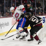 
              Montreal Canadiens' Joel Armia (40) gets sandwiched between Arizona Coyotes' Patrik Nemeth, middle, and Troy Stecher (51) in the second period during an NHL hockey game, Monday, Dec. 19, 2022, in Tempe, Ariz. (AP Photo/Darryl Webb)
            