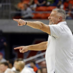 
              Auburn coach Bruce Pearl directs players during the first half of the team's NCAA college basketball game against Colgate on Friday, Dec. 2, 2022, in Auburn, Ala. (AP Photo/Butch Dill)
            