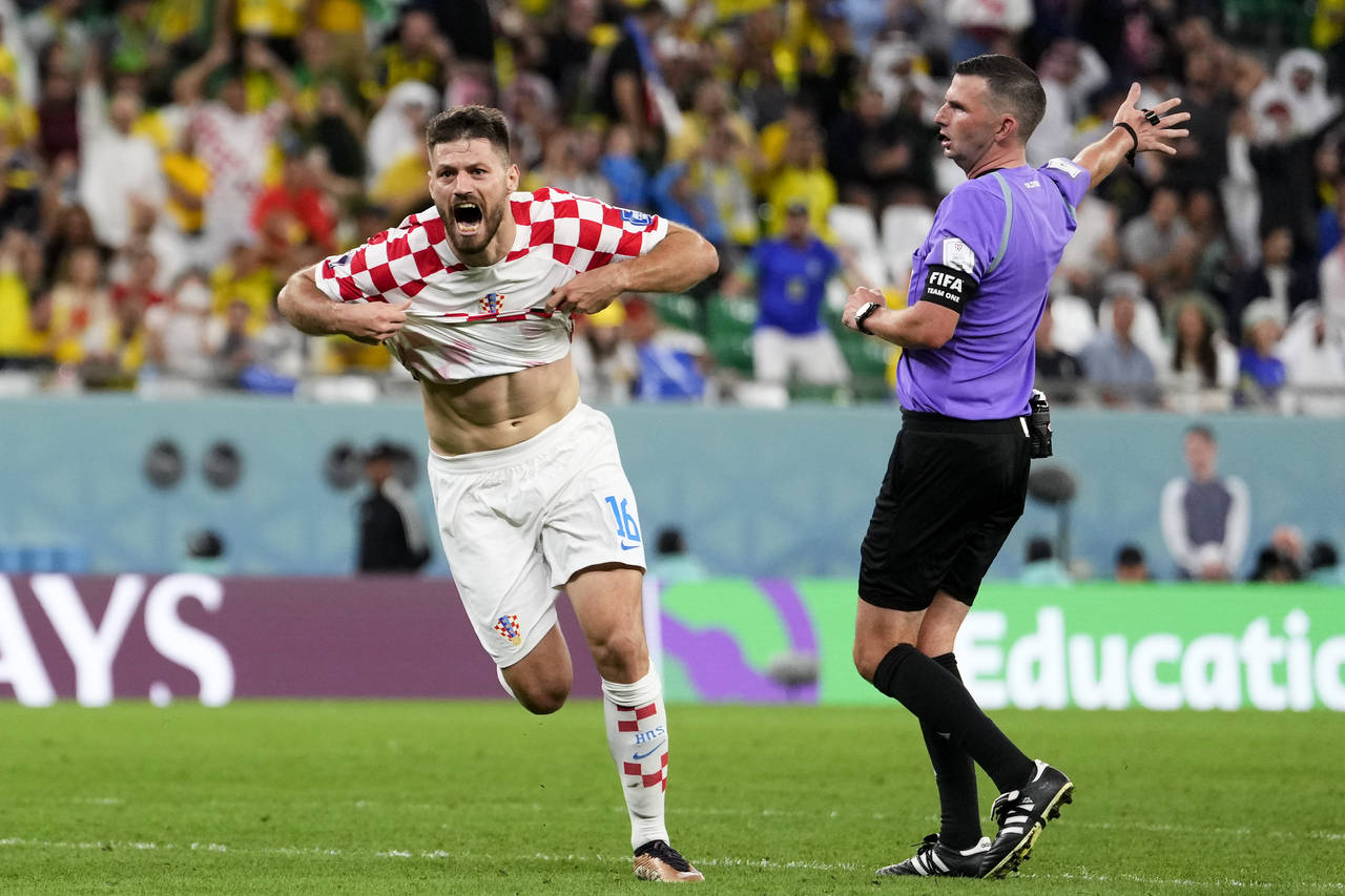 Croatia's Bruno Petkovic celebrates scoring his side's opening goal during the World Cup quarterfin...