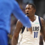 
              Dallas Mavericks forward Dorian Finney-Smith reacts after hitting a basket during the second half of the team's NBA basketball game against the Denver Nuggets on Tuesday, Dec. 6, 2022, in Denver. (AP Photo/David Zalubowski)
            
