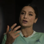 
              Nadia Nadim gestures as she speaks during an interview with The Associated Press in Doha, Qatar, Thursday, Dec. 1, 2022. Danish women's national team player Nadia Nadim was about to settle in for her job as a television commentator at the World Cup when she was shaken by tragic news: Her mother, who had helped the family flee the Taliban when Nadim was just a girl, had been hit by a car while rushing home to watch her daughter on TV. (AP Photo/Hassan Ammar)
            