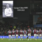 
              A minute of silence for the late English professional soccer player George Cohen before the English Premier League soccer match between Aston Villa and Liverpool at Villa Park in Birmingham, England, Monday, Dec. 26, 2022. (AP Photo/Rui Vieira)
            